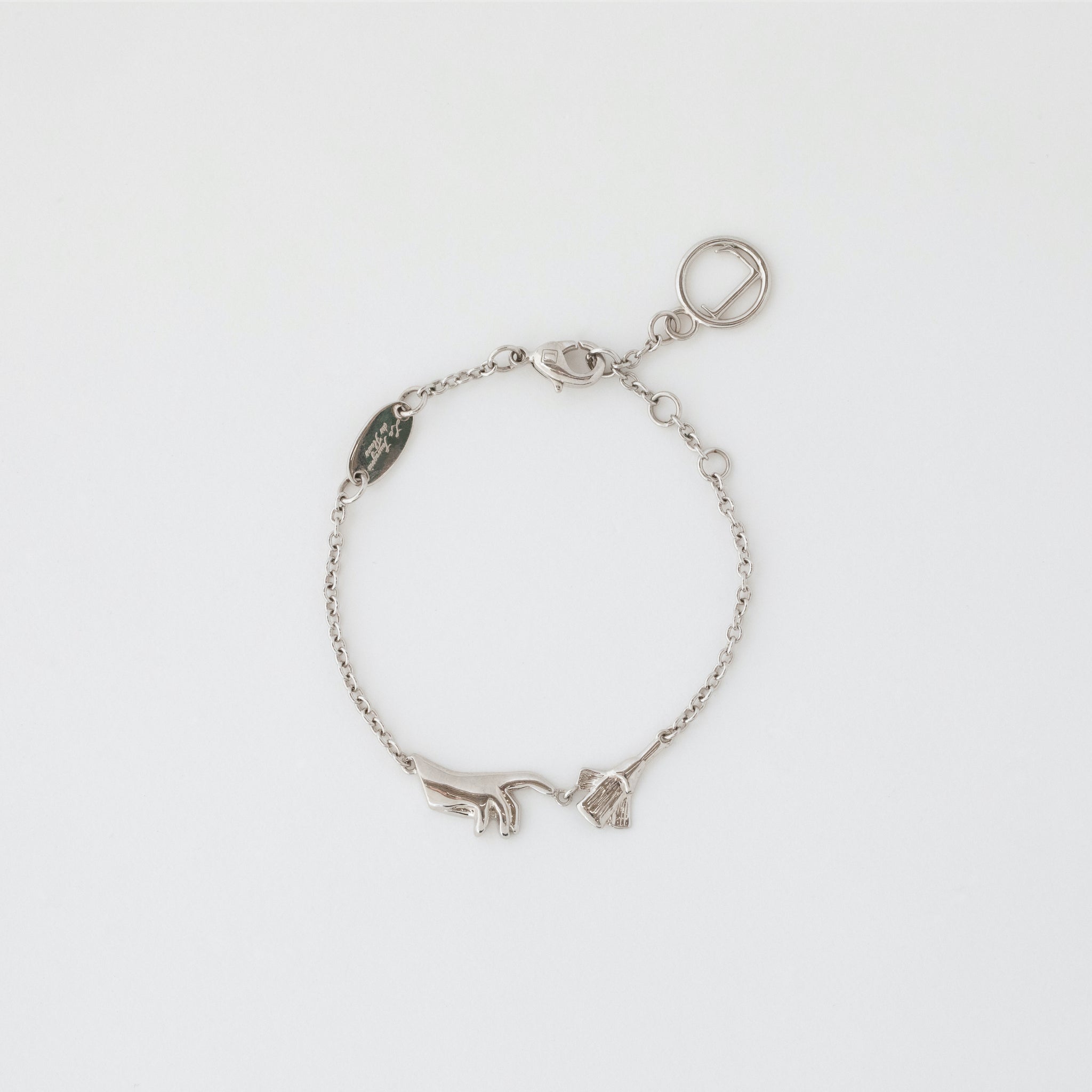 HAND AND FLOWER BRACELET PLATINUM