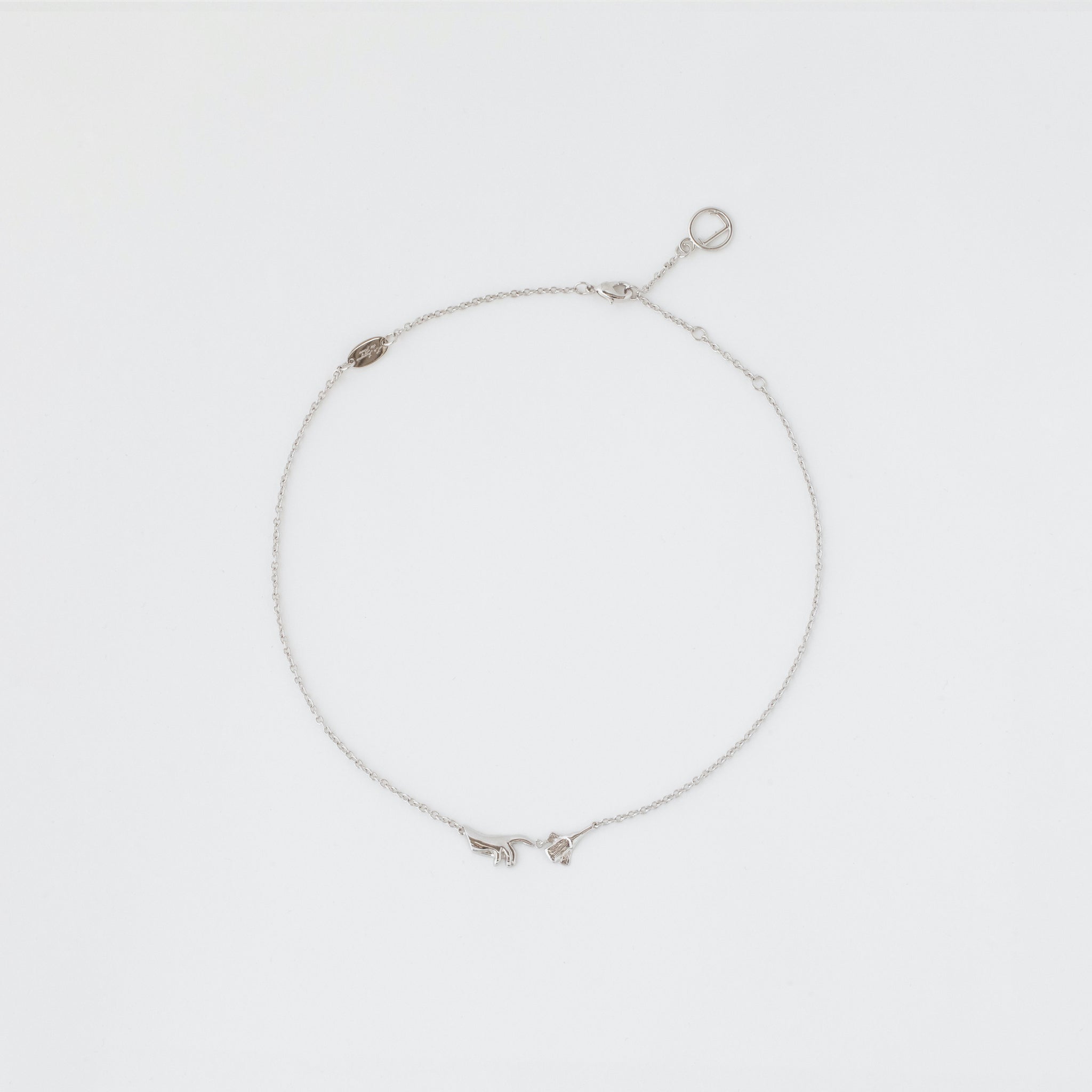 HAND AND FLOWER NECKLACE PLATINUM